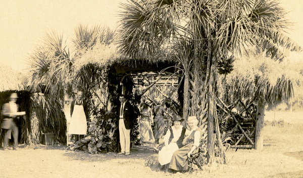 Postcard showing Koreshans at their fair exhibition in Estero, Florida.