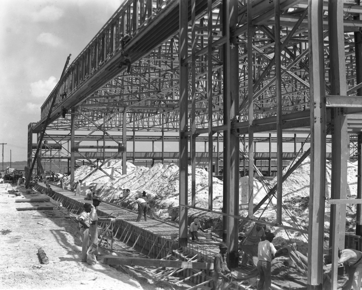 Close-up view showing seaplane hangars under construction near Lake Okeechobee.