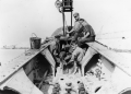 Close-up view showing construction workers assembling dragline near Lake Okeechobee.