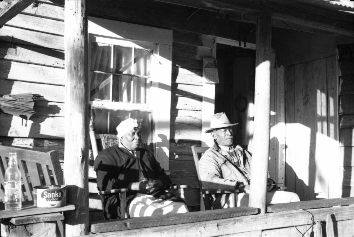 Couple on their porch.