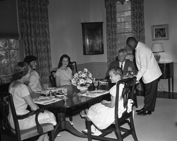 Governor Collins having dinner with his family in Tallahassee.