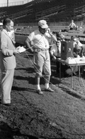 FSU's head football coach Bill Peterson using telephone on sideline inside Doak Campbell Stadium in Tallahassee.