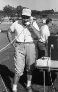 FSU's head football coach Bill Peterson using telephone on sideline inside Doak Campbell Stadium in Tallahassee.