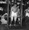 FSU football player lifting weights after practice in Tallahassee.
