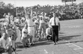 FSU offensive ends coach Bobby Bowden on sideline with players during game in Tallahassee against the University of Kentucky.