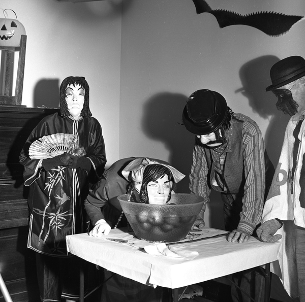 Bobbing for apples during the Golden Age Halloween Party at the Palmer Munroe Center in Tallahassee.