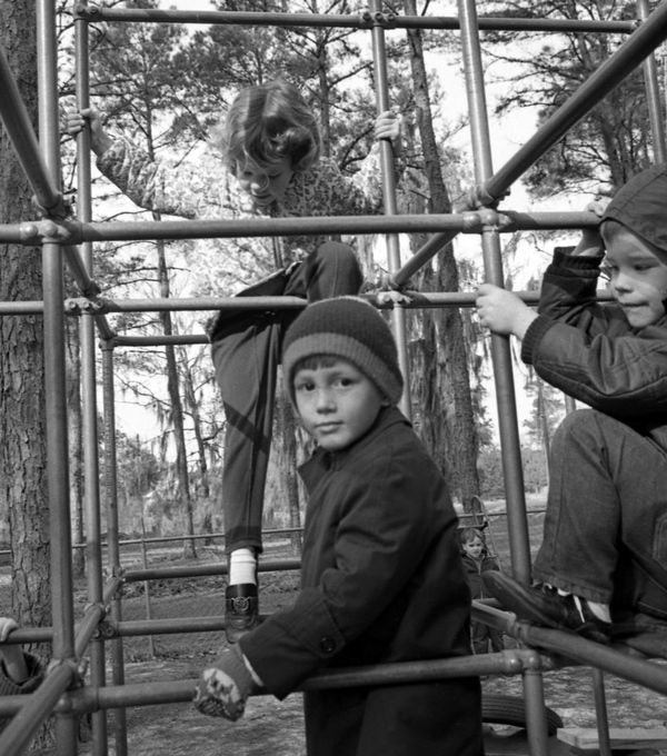 Nursery school children on junglegym during recess in Tallahassee.