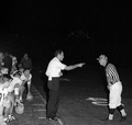 FSU head football coach Bill Peterson speaking with referee during game in Tallahassee against UGA.