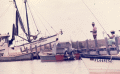 African American people fishing from the docks on St. George Island in Franklin County, Florida.