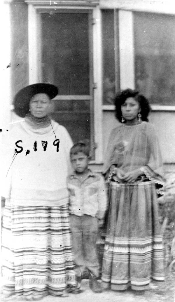 Seminole women and a little boy