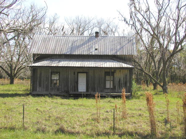 Small "cracker" house off State Road 26 a few miles west of Melrose.