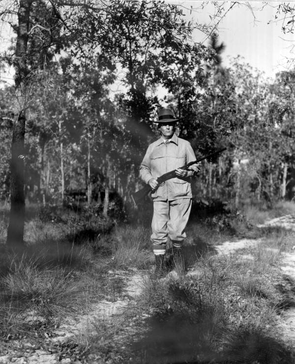 Deer hunter Winship Nunnally, of Atlanta, Ga., walking through the woods in Homosassa Springs.