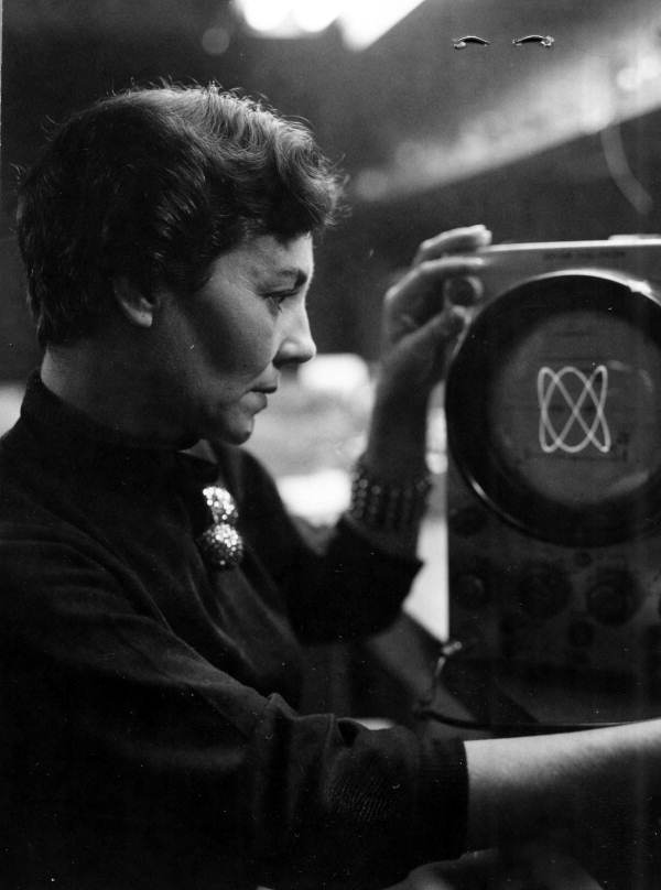 Clementine Fowler reading oscilloscope to test components manufactured at the Johnson Electronics Company plant in Casselberry, Florida.
