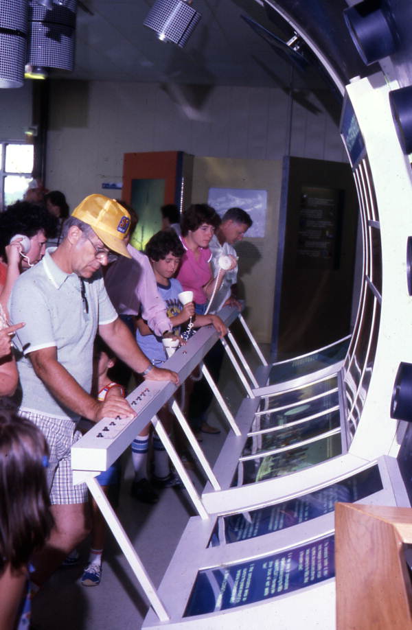 Visitors viewing museum exhibit at the Kennedy Space Center on Merritt Island near Titusville, Florida.