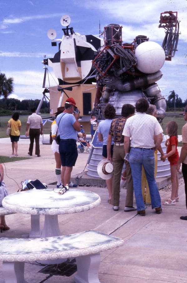 Visitors viewing the Saturn V J-2 rocket engine in the Kennedy Space Center rocket garden on Merritt Island near Titusville, Florida.