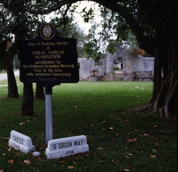 Historical marker at the site of the Coral Gables Plantation packing house.