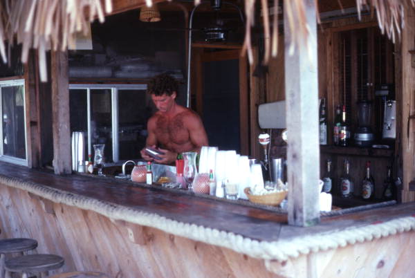 Bartender at the Crustacean's restaurant outdoor bar in Jacksonville Beach.