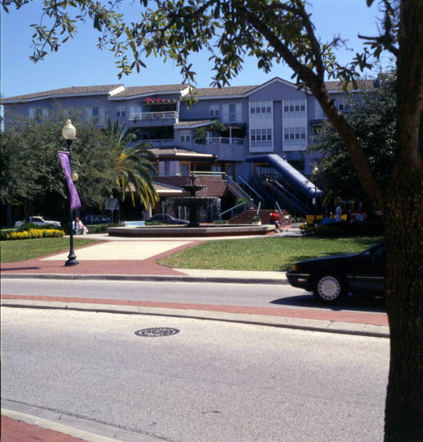 View looking east toward the fountain in the historic Hyde Park district between Dakota Ave. and Village Cir. in Tampa, Florida.