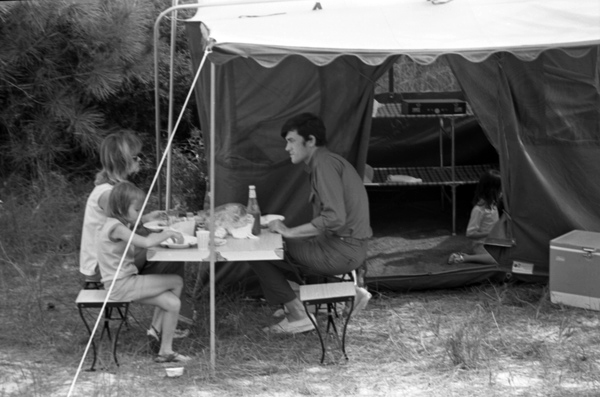 Campers picnicking at their T. H. Stone Memorial St. Joseph Peninsula State Park campsite.