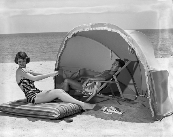 Couple relaxing at Miami Beach.