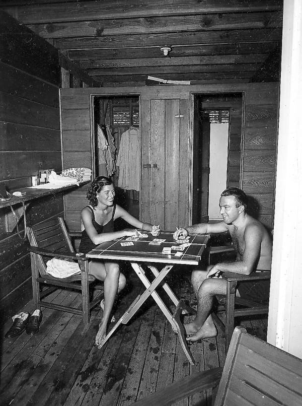 Mr. and Mrs. Lawrence E. Klein in their beach cabana at the Roney Plaza Hotel