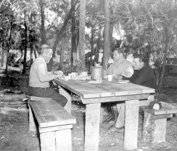 Joseph Block and Jack Alson having lunch with their guide after morning fishing in the Homosassa River