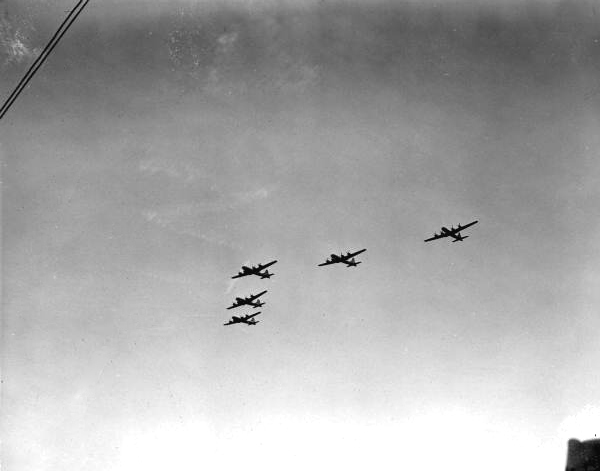 B-29 bombers fly over the Gasparilla Carnival - Tampa, Florida.