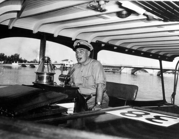 Man with cigar cruising aboard the Southward Ho - Palm Beach, Florida