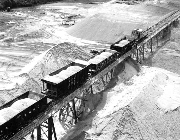 Bird's eye view showing electric railway shipping ACL cars full of phosphate to the IMC central plant for processing in Mulberry, Florida.
