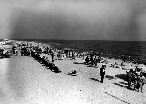 Crowds enjoying the sun and surf.