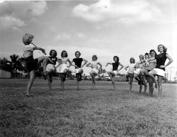 Miami Jackson High School majoriettes drill on the field - Miami, Florida