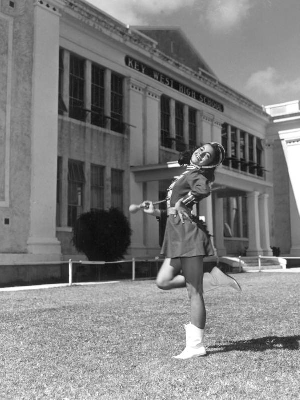 Anne Yates, a majorette, in front of Key West High School - Key West, Florida