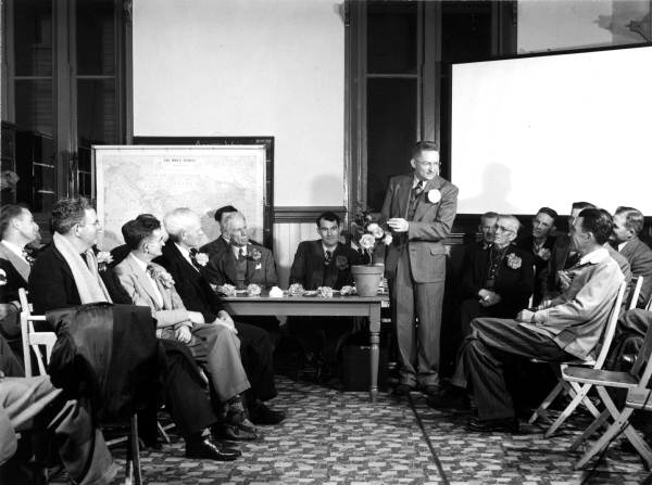 Members of the Men's Camellia Club meet to discuss the flower show - Pensacola, Florida.
