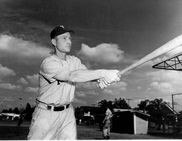 Charlie "Red" Roberts demonstrates "breaking wrist" for power drive to class..