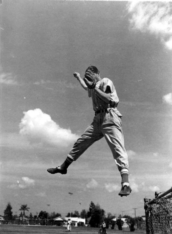 Eldon Konzen, outfielder, grabs a high ball - Tampa, Florida