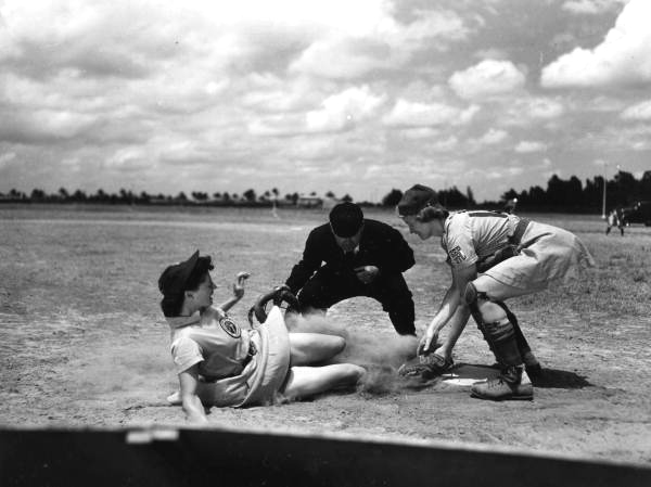 Marg Callaghan slides into plate - Opa-locka, Florida