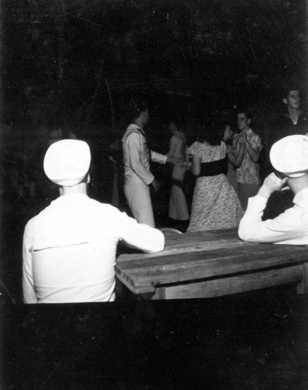 Sailors watching people dancing at the YMCA service club - Key West, Florida