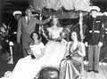 Flanked by Marine Corps officers, Congressman A.S. (Sid) Herlong, Jr., crowns the watermelon festival queen, Dolly Dean Beard of Leesburg - Leesburg, Florida