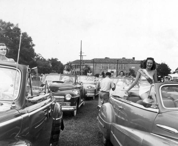 Beauty contestants riding in cars at Live Oak's Tobacco Festival - Live Oak, Florida