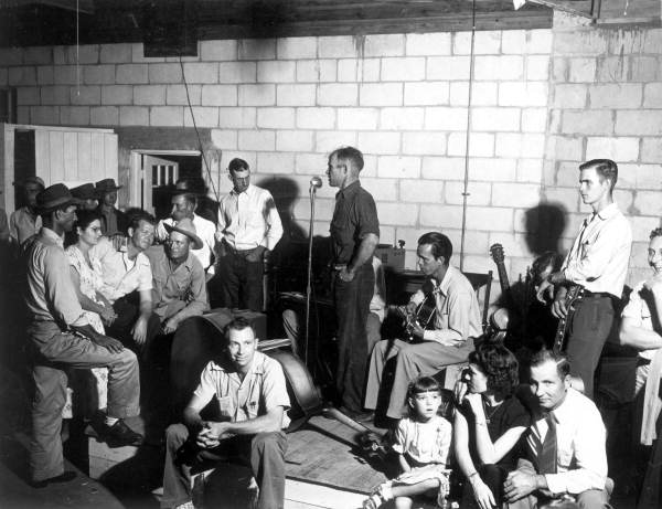 Musicians and crowd at a square dance following the rodeo - Okeechobee, Florida