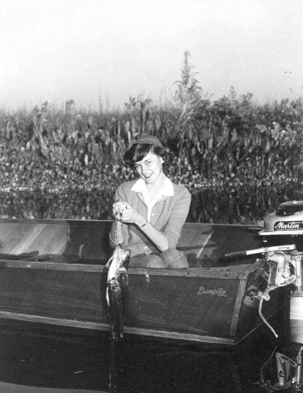 Jean Chrissinger proudly displaying her string of fish - Leesburg, Florida