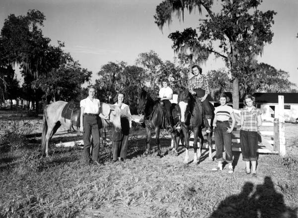 Horseback riders at the Country club - Howey-in-the-Hills, Florida