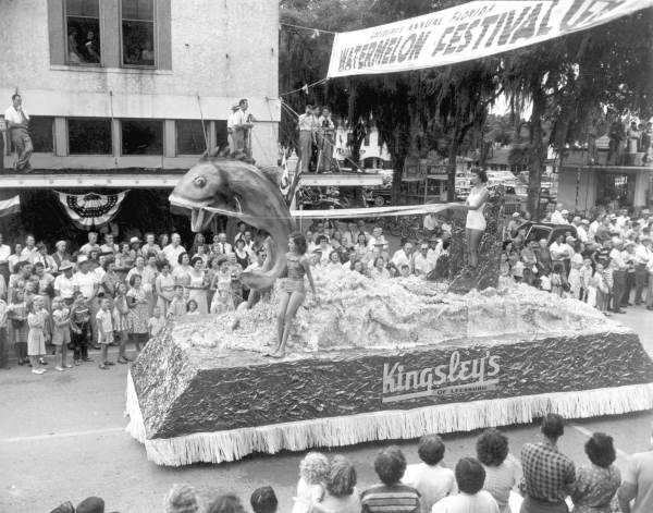 Young women on the Kingley's of Leesburg float in the parade at the watermelon festival - Leesburg, Florida