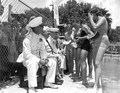 Marine Corps officers judging the participants in the watermelon eating contest at the watermelon festival - Leesburg, Florida