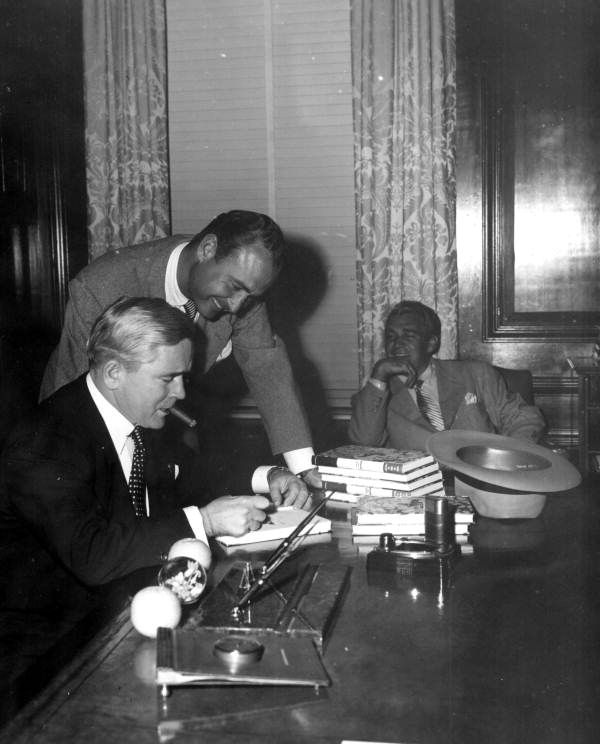Governor Warren signs an autograph for one of "Crosswinds" cast - Tallahassee, Florida.
