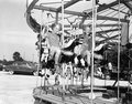 Children enjoying the merry-go-round at the watermelon festival carnival - Leesburg, Florida