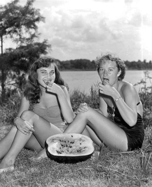 Carolyn Vaughn and Carol Cox enjoy a slice of watermelon at the watermelon festival - Leesburg, Florida
