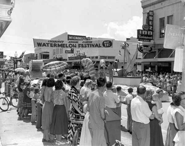 People gathered on the street to watch the parade at the watermelon festival - Leesburg, Florida