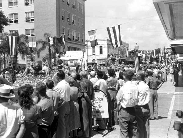 People gathered on the street to watch the parade at the watermelon festival - Leesburg, Florida