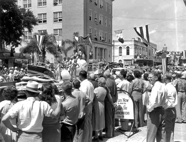 People gathered on the street to watch the parade at the watermelon festival - Leesburg, Florida